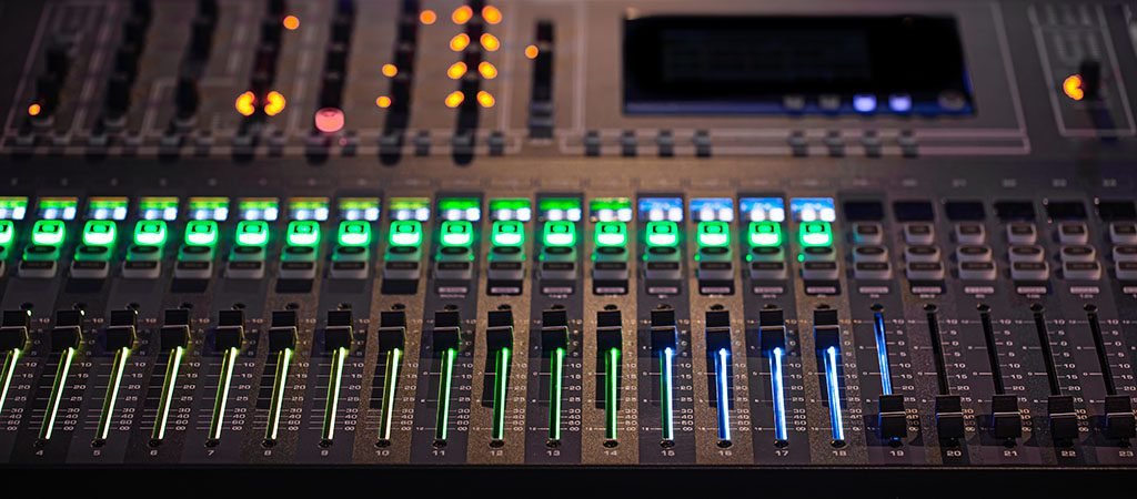 Digital mixer in a recording Studio. Work with sound. The concept of creativity and show business. Space for text.
